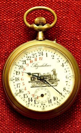Eine französische Eisenbahneruhr, deren Ziffernblatt 24 Stunden umfasst.
