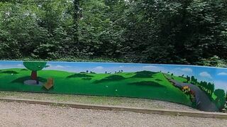 Die „Kunst aus der Sprühdose“ am Bouleplatz im Gartenschaupark – die graue Betonwand ist verschwunden.