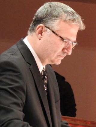 Özer Dogan dirigiert die Sänger des AGV Belcanto.