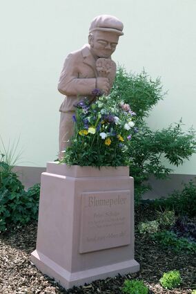 Einweihung des Blumepeter-Denkmals an der Kreuzung Schwetzinger Straße/Waldpfad. Bild: Moosbrugger