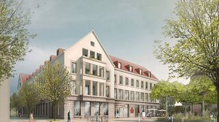 So soll das künftige Sparkassenquartier in Speyer einmal aussehen. Eine Projektion zeigt den Blick auf den Haupteingang, davor eine Grünanlage.