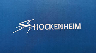 Wettbewerbsergebnis: Die Kombination aus dem geschwungenen „S“ und dem Wort Hockenheim lässt sowohl an den Ring als auch an den Kraichbach denken.