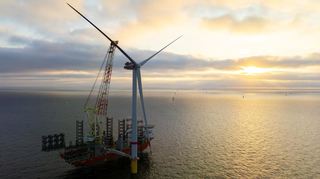 Die DHL Group wird künftig Strom aus der Windenergieanlage "He Dreiht" der EnBW beziehen.