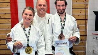 Laura Überall, Jens Macheledt und Lukas Stadler bei der DM in Bochum.
